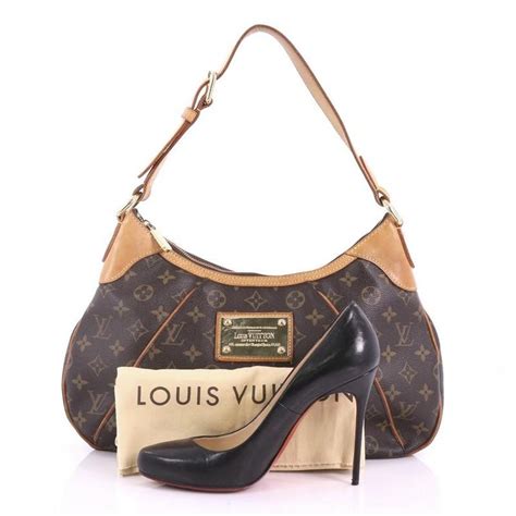 louis vuitton bag with gold plate